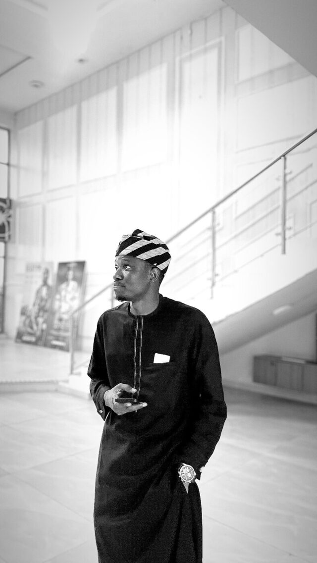 Ridwan Oladimeji in agbada and fila